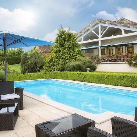 Logis Hotel-Restaurant Les Voyageurs La Coquille ภายนอก รูปภาพ