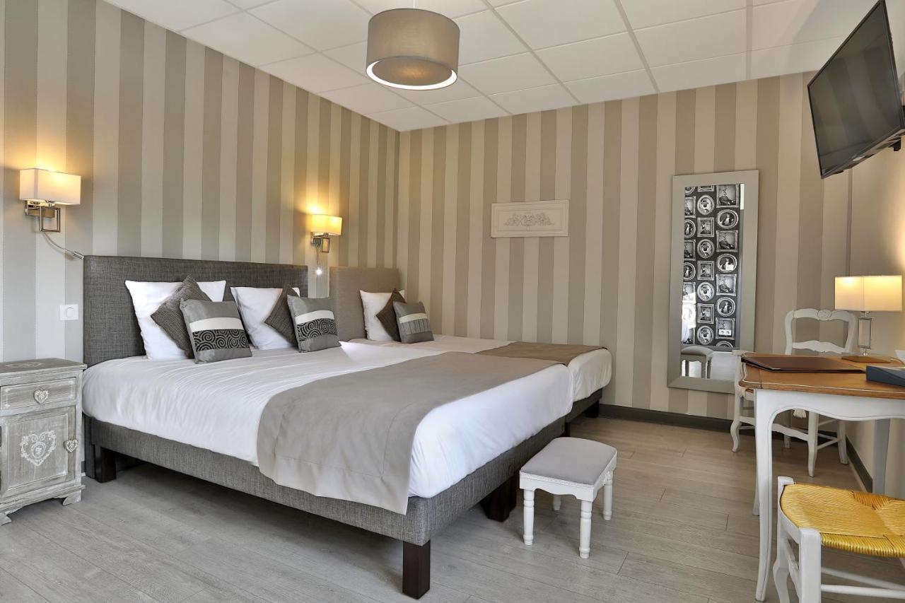 Logis Hotel-Restaurant Les Voyageurs La Coquille ภายนอก รูปภาพ
