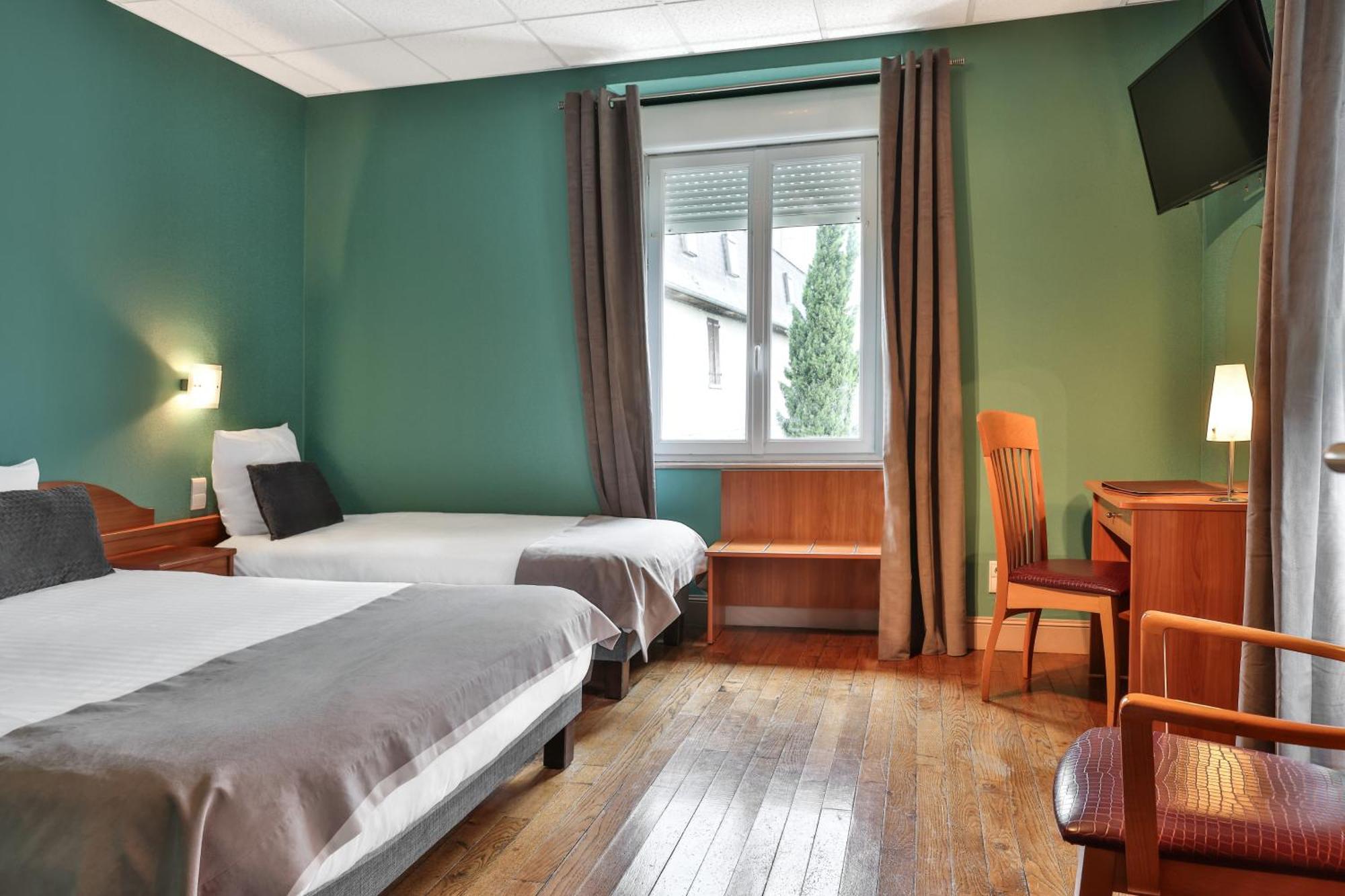Logis Hotel-Restaurant Les Voyageurs La Coquille ภายนอก รูปภาพ