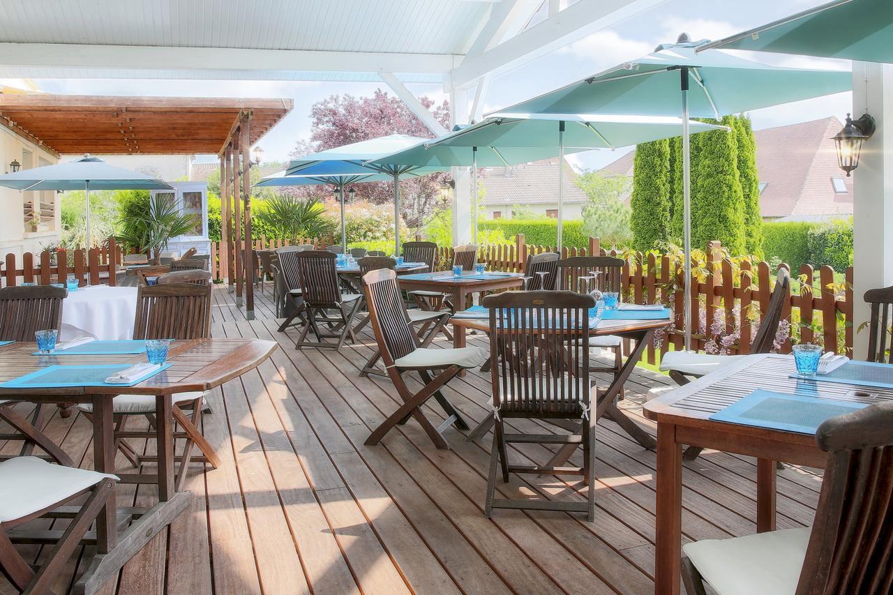 Logis Hotel-Restaurant Les Voyageurs La Coquille ภายนอก รูปภาพ